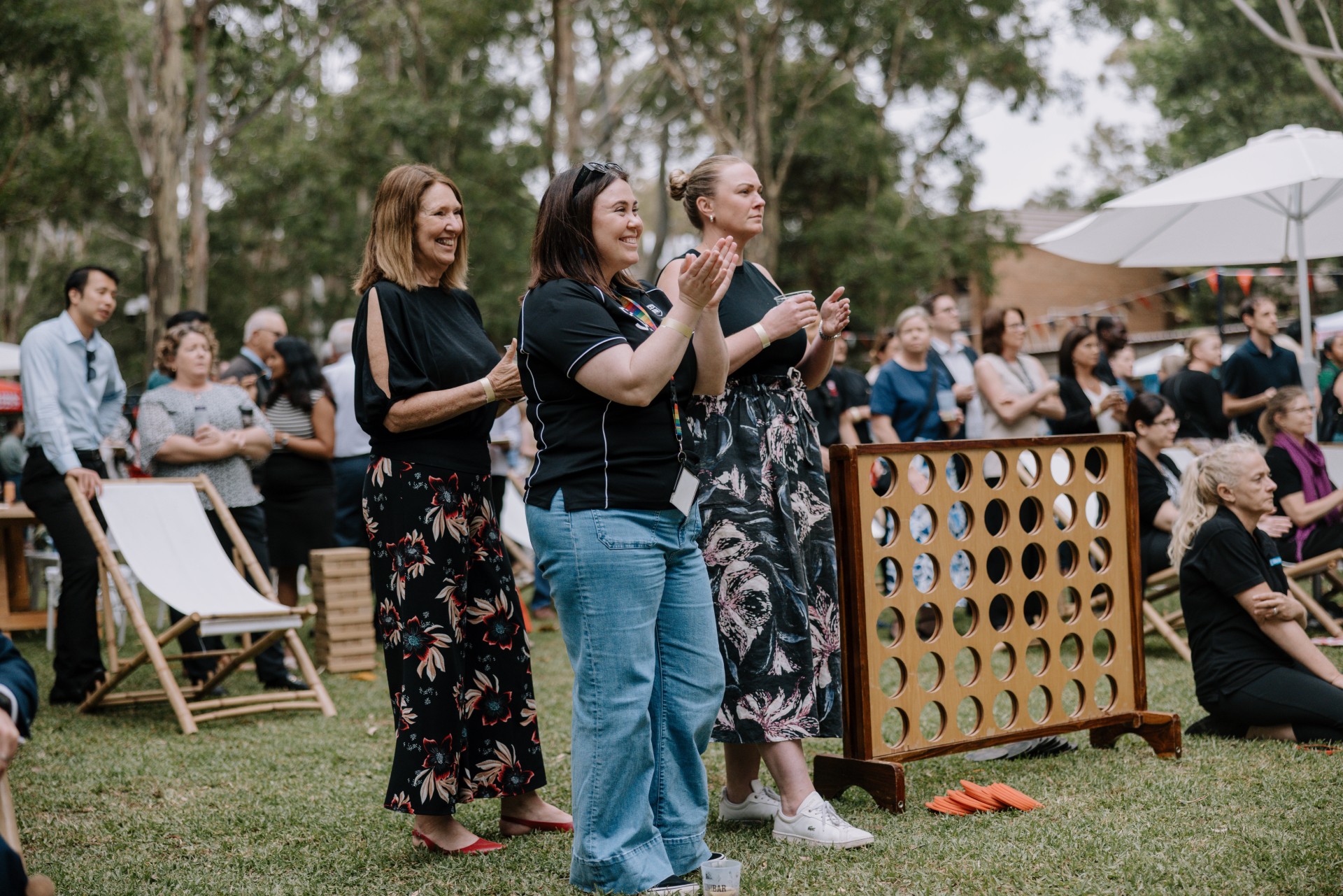 uow staff celebrating outside for 50th event
