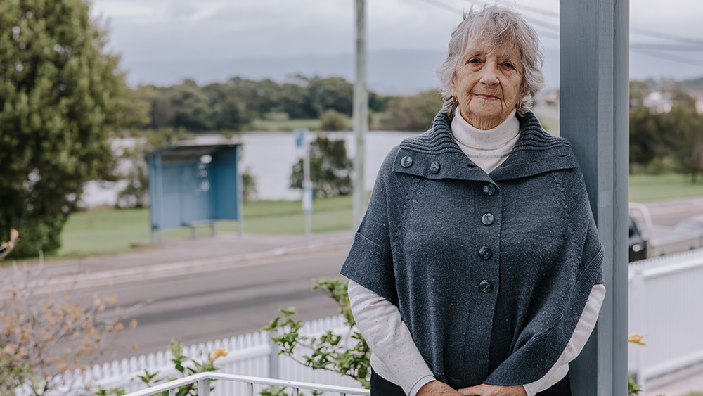 Aunty Barb Nicholson standing with Coomaditchy Reserve in the background