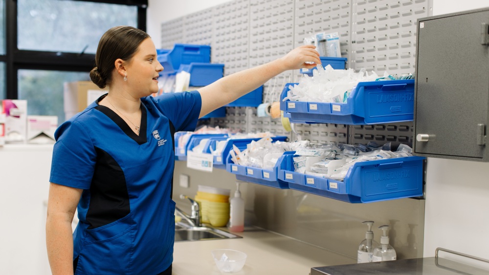 A nursing student in lab