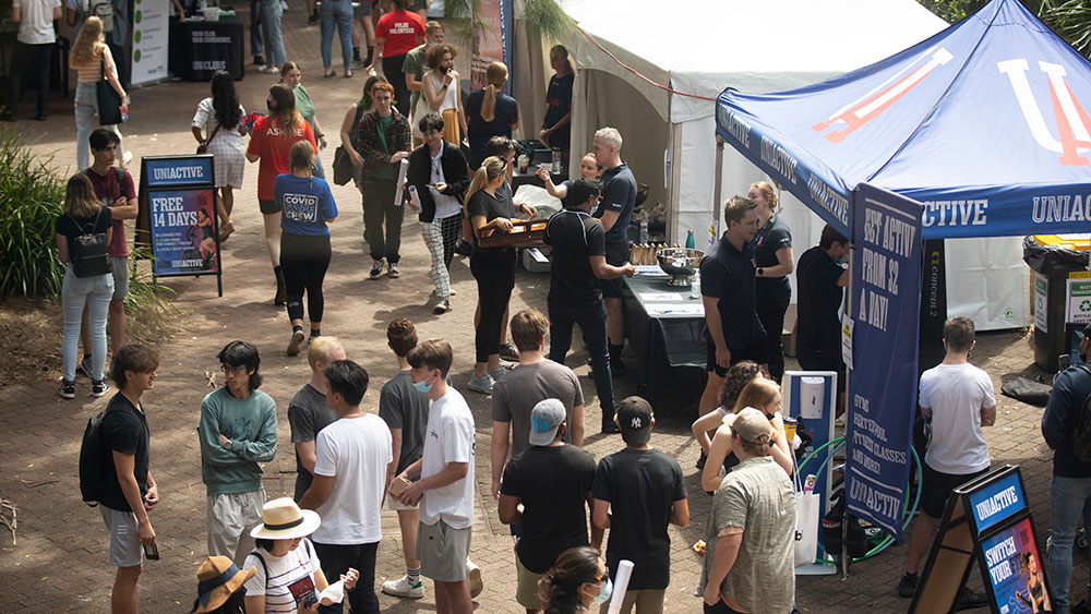 An aerial photo of market stalls and students at UOW Orientation Week in 2022.