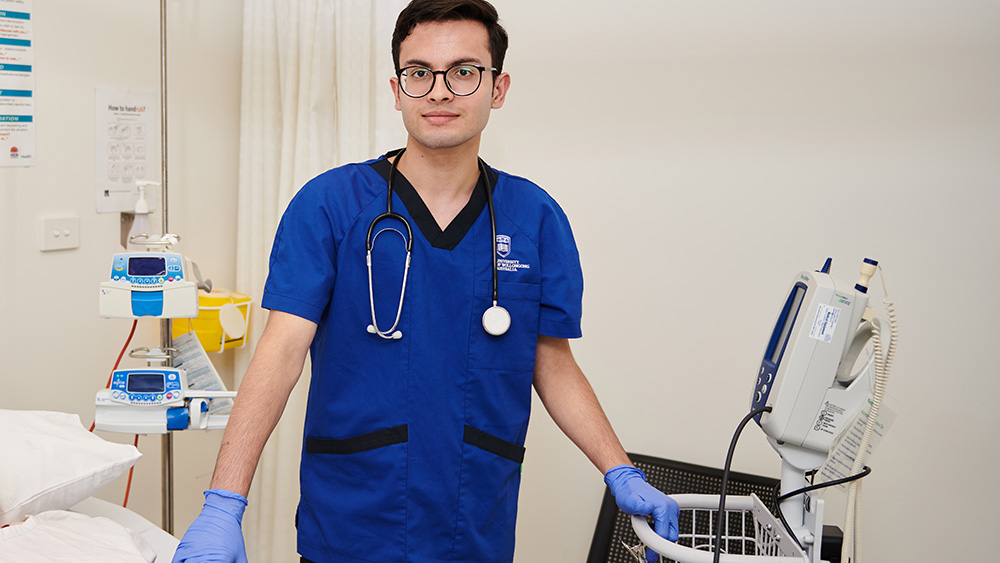 UOW nursing student Sudarshan Thapa at the UOW Bega Valley Nursing Lab