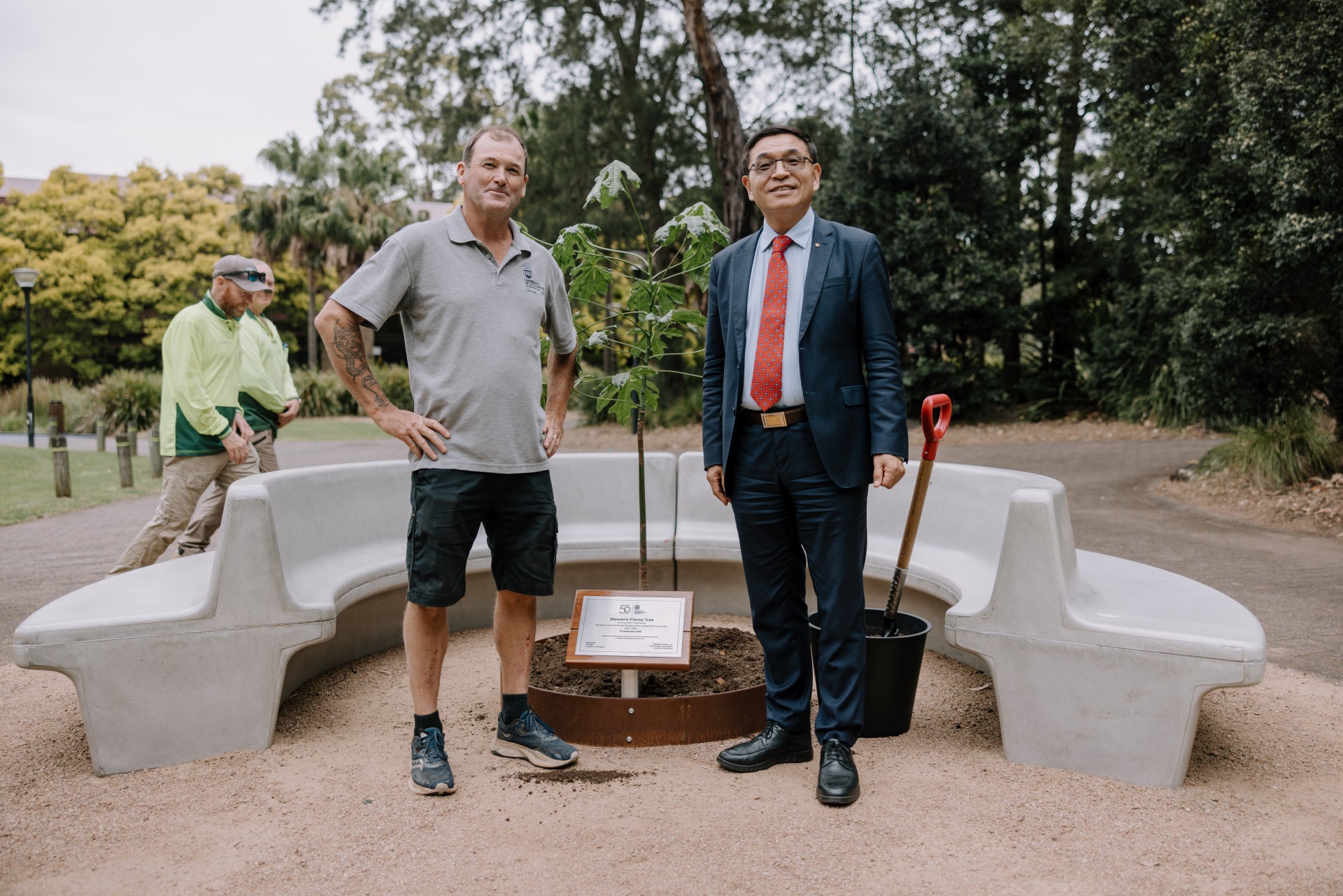 Max smiling after planting the 50th tree
