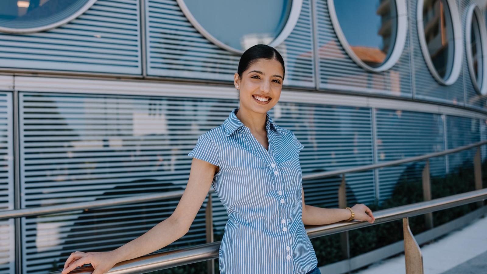 Liverpool student standing in front of new campus