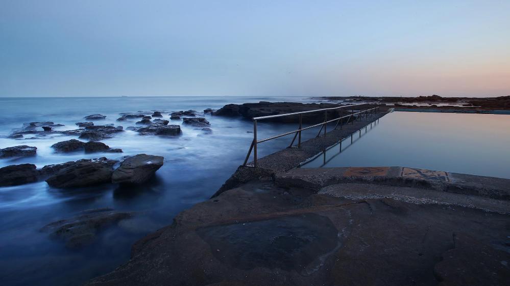 Pools of the Illawarra with flowing steam
