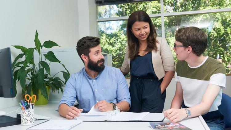 students in group at desk