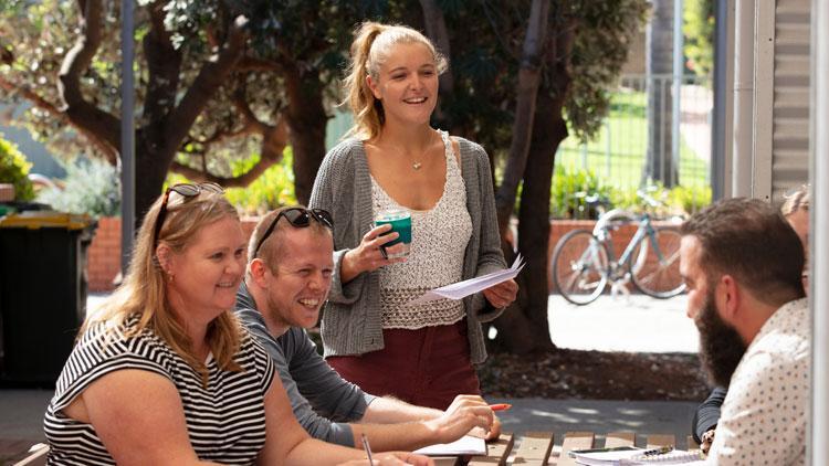 Students talking in courtyard