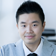 Young man in grey suit