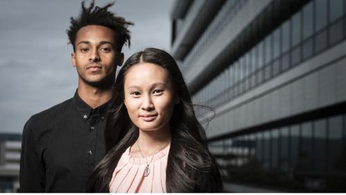 Two students standing