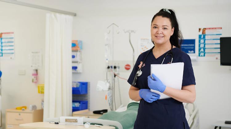 Female Nursing student in uniform in lab