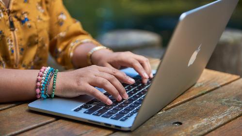 hands-typing-on-laptop