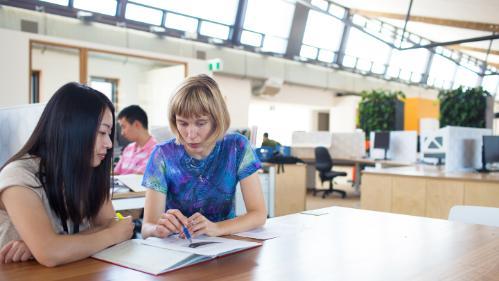 Female student consulting with female academic in SBRC