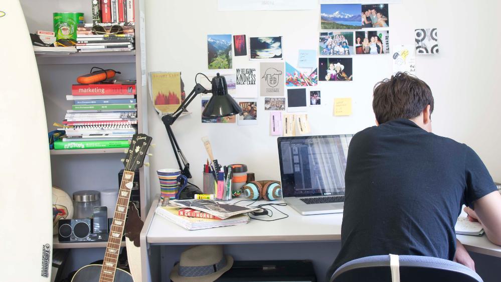 A student studying at a desk