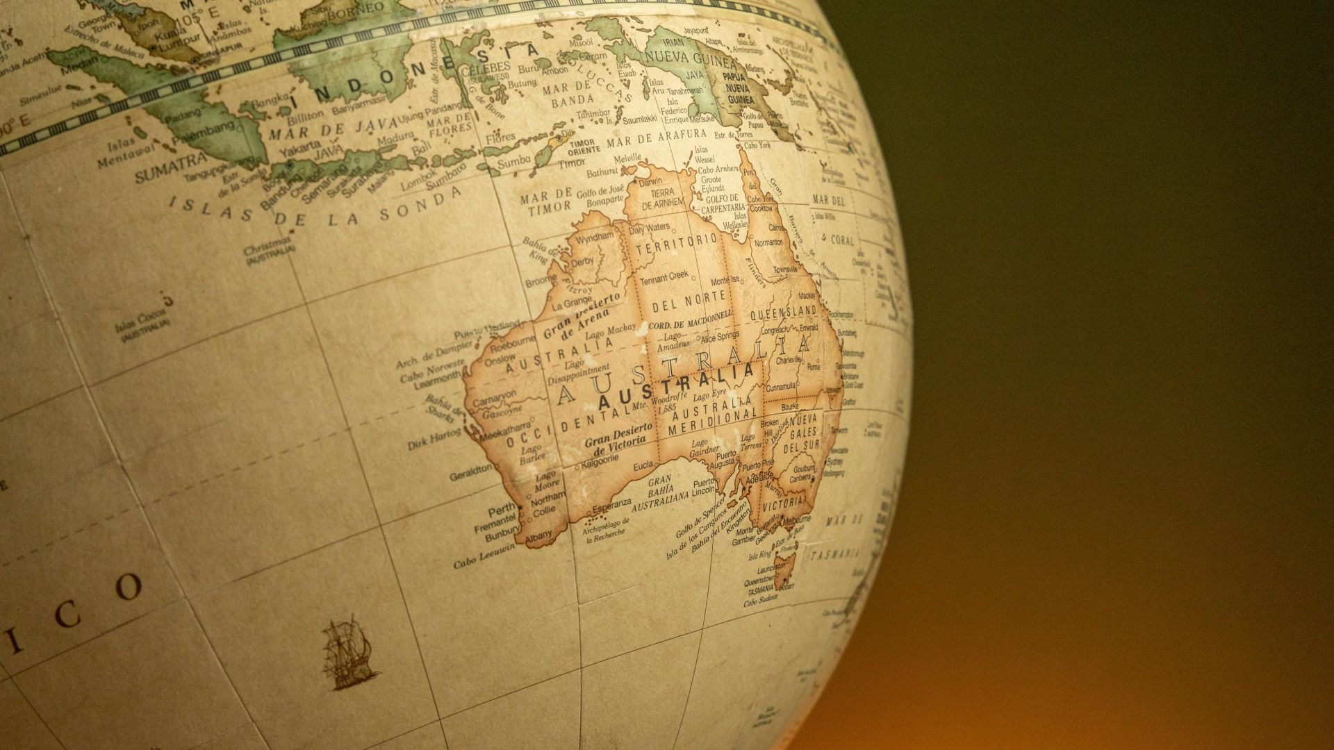 Vintage style world globe with a focus on Australia