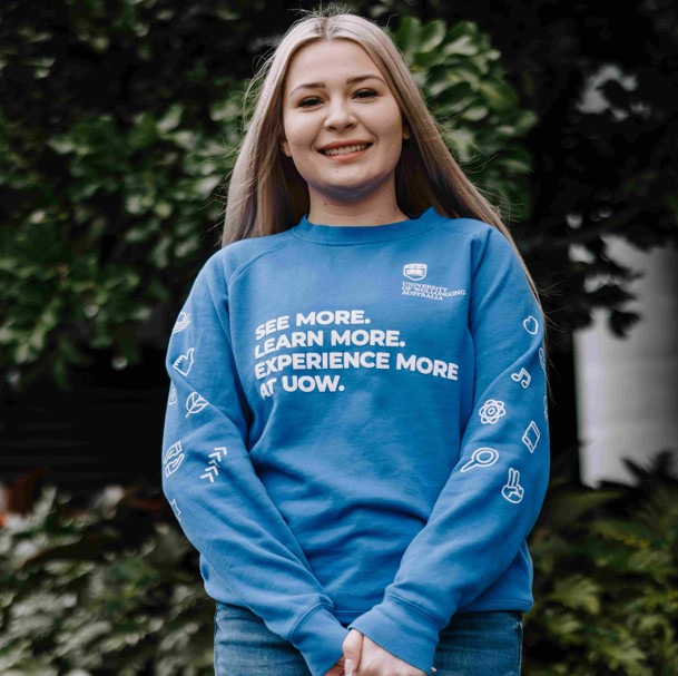 Valeria Leonova wearing blue jumper