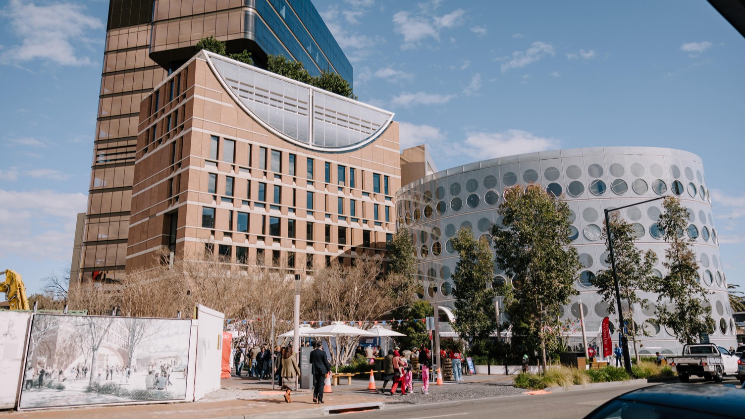 Modern buildings and pedestrians at Liverpool Civic Place precinct.