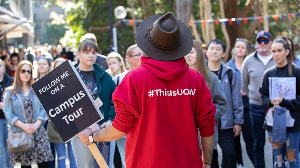 student running campus tour