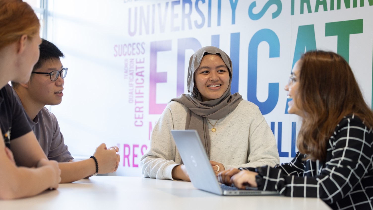 A group of students studying inside