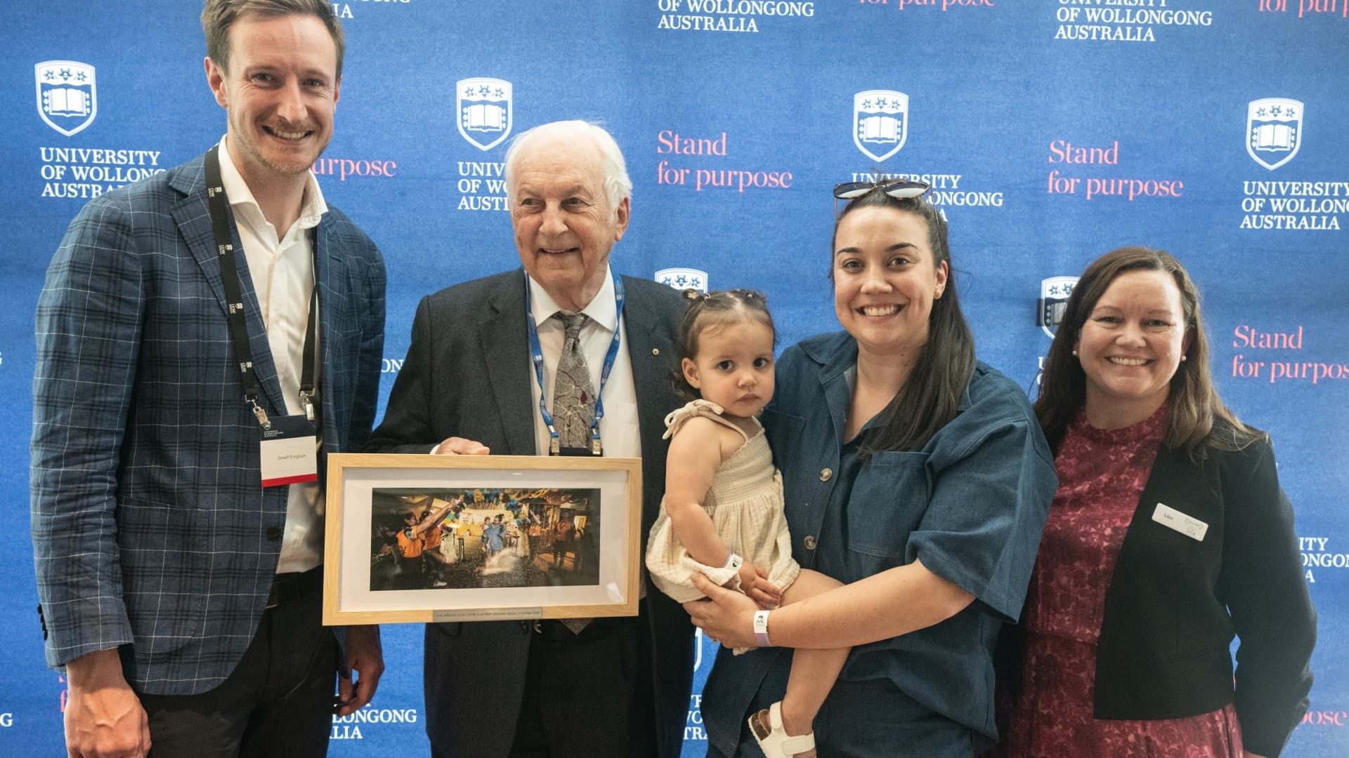 Josef English, Christopher Abbott and Lisa Kervin with the one millionth visitor to the Discovery Space in 2024. Photo: Michael Gray