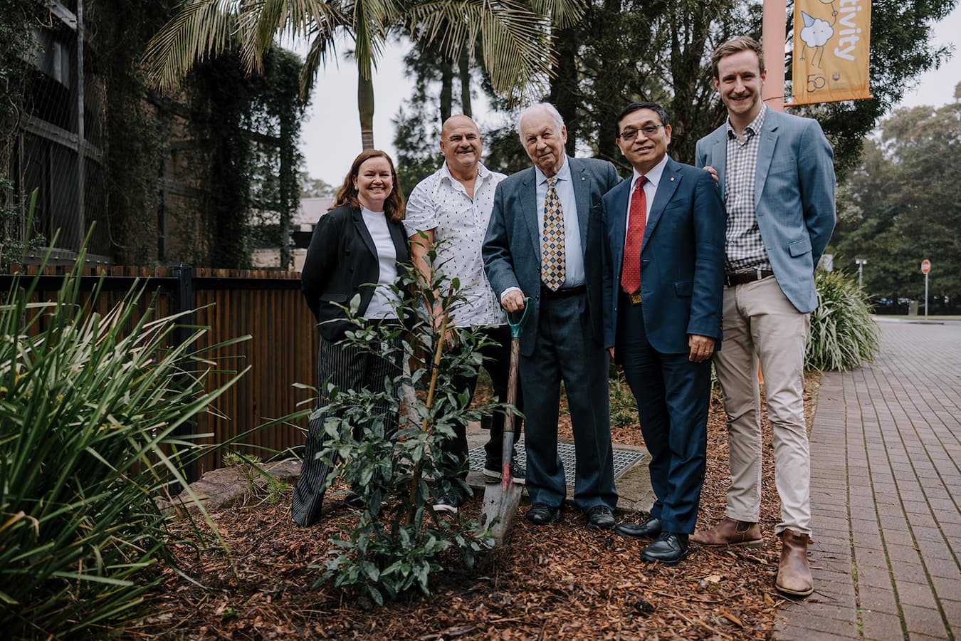 Lisa Kervin, Paul Chandler, Christopher Abbott, Max Lu and Josef English stand outside the Discovery Space at UOW during its 10th birthday celebration. Photo: Michael Gray