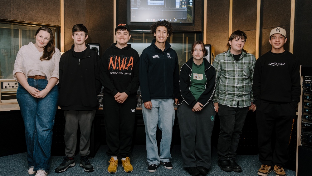 Teacher Lauren Crockett with Boorowa Central School music students touring music facilities at UOW with UOW student ambassador Xavier Zo. Credit: Michael Gray