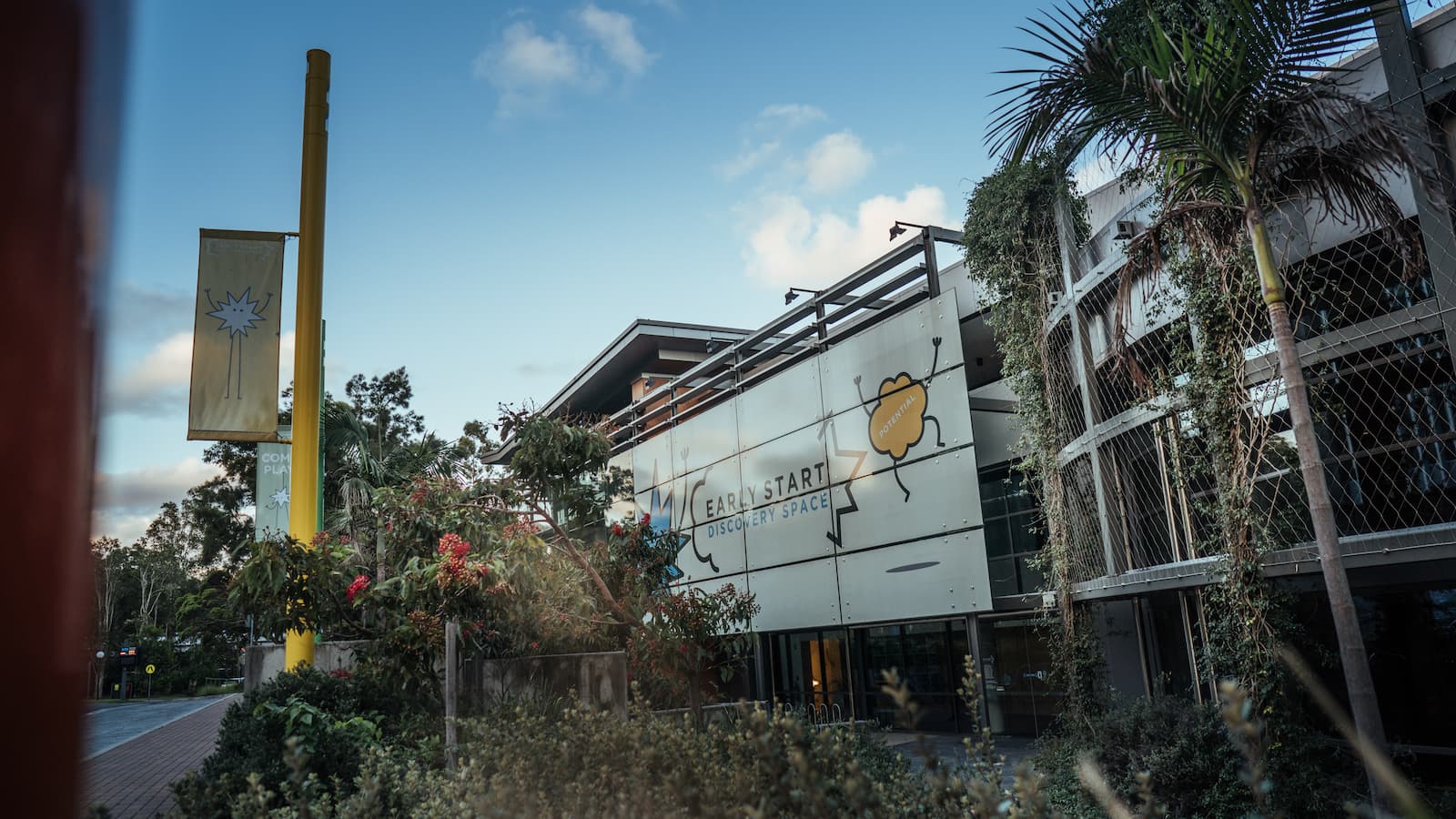 An external shot of the Early Start Building with a gumtree in the foreground. Photo: Aristo Risi