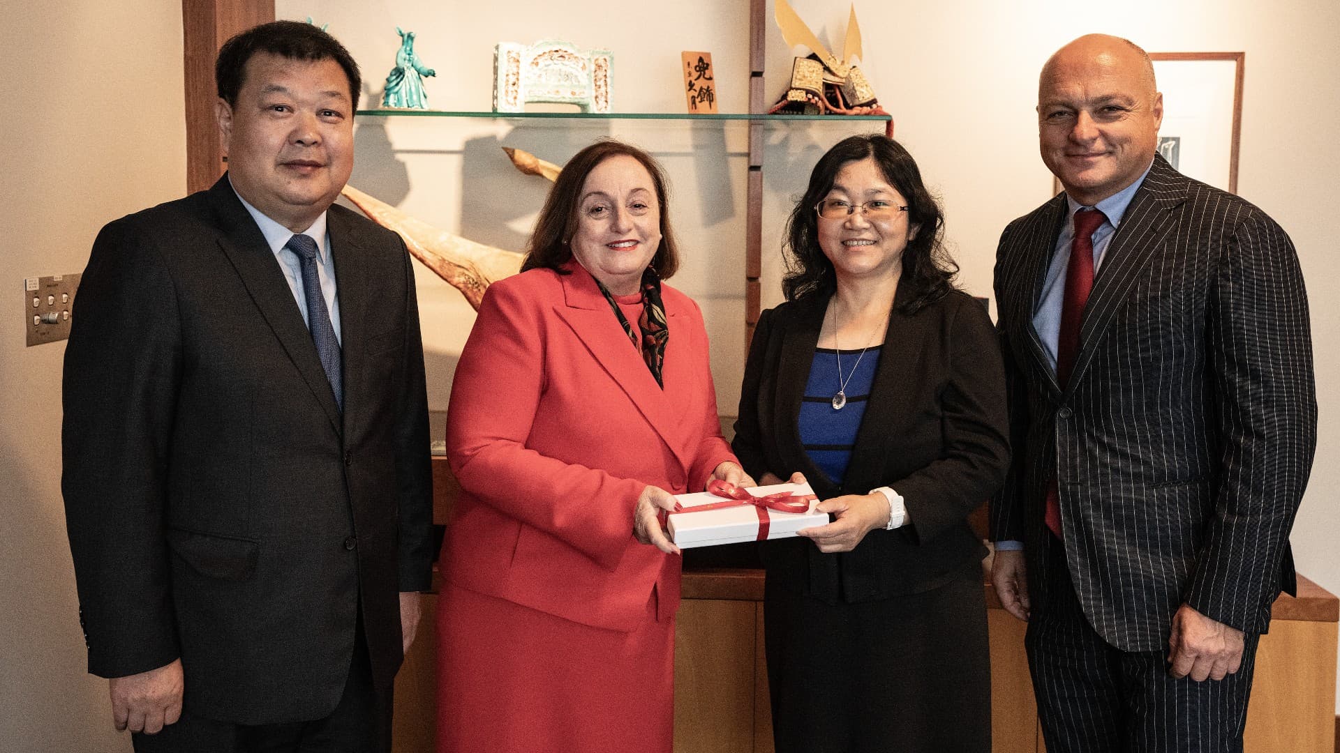 Consulate General of China in Sydney  Zhou Limin, UOW Vice-Chancellor Professor Patricia Davidson, Consul (Education) Ms Li Xiaojun, Professor Alex Frino, Senior Deputy Vice-Chancellor UOW. They are all smiling at the camera. Photo: Paul Jones