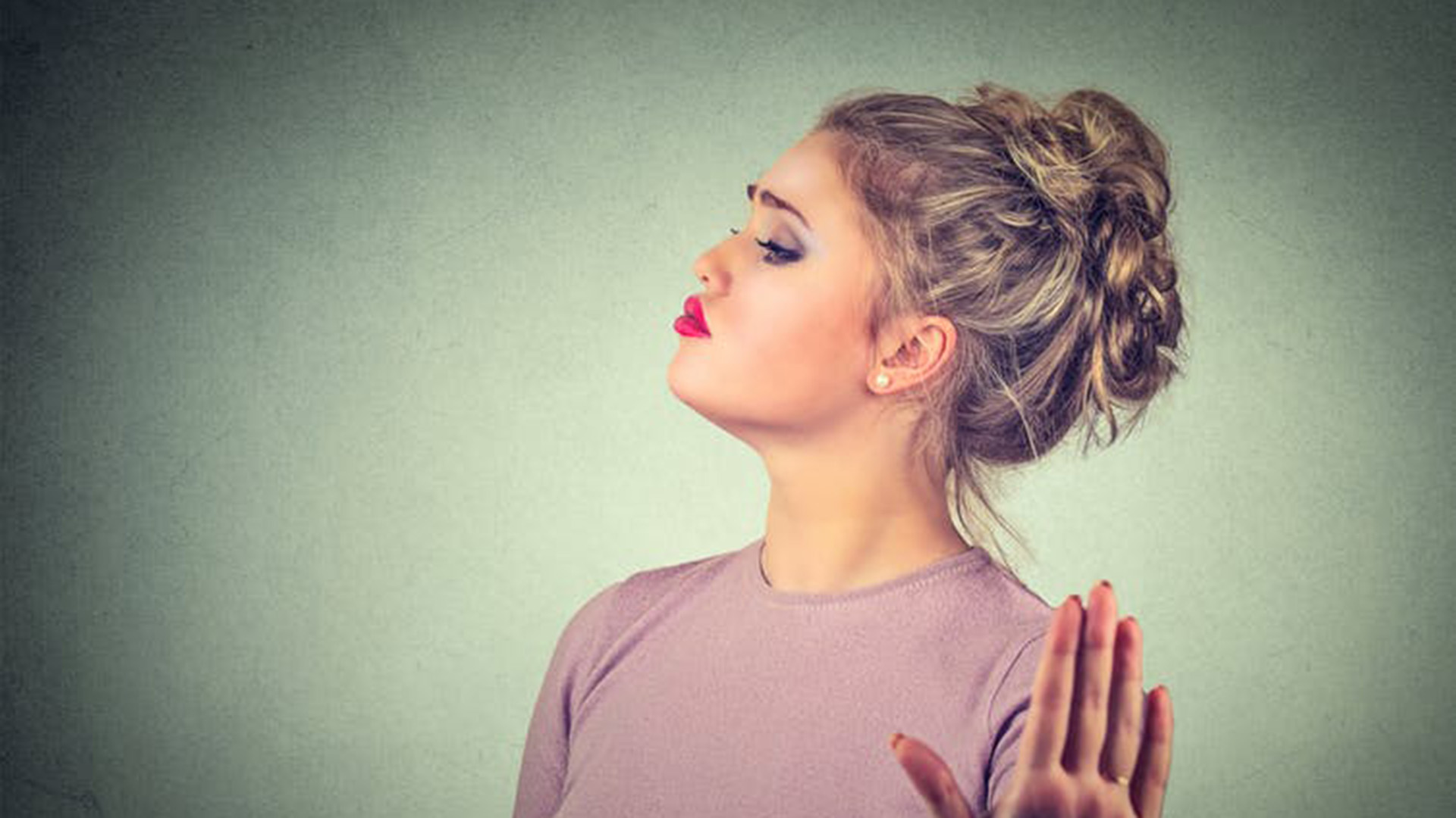 Young woman saying no to a job. Photo from Shutterstock