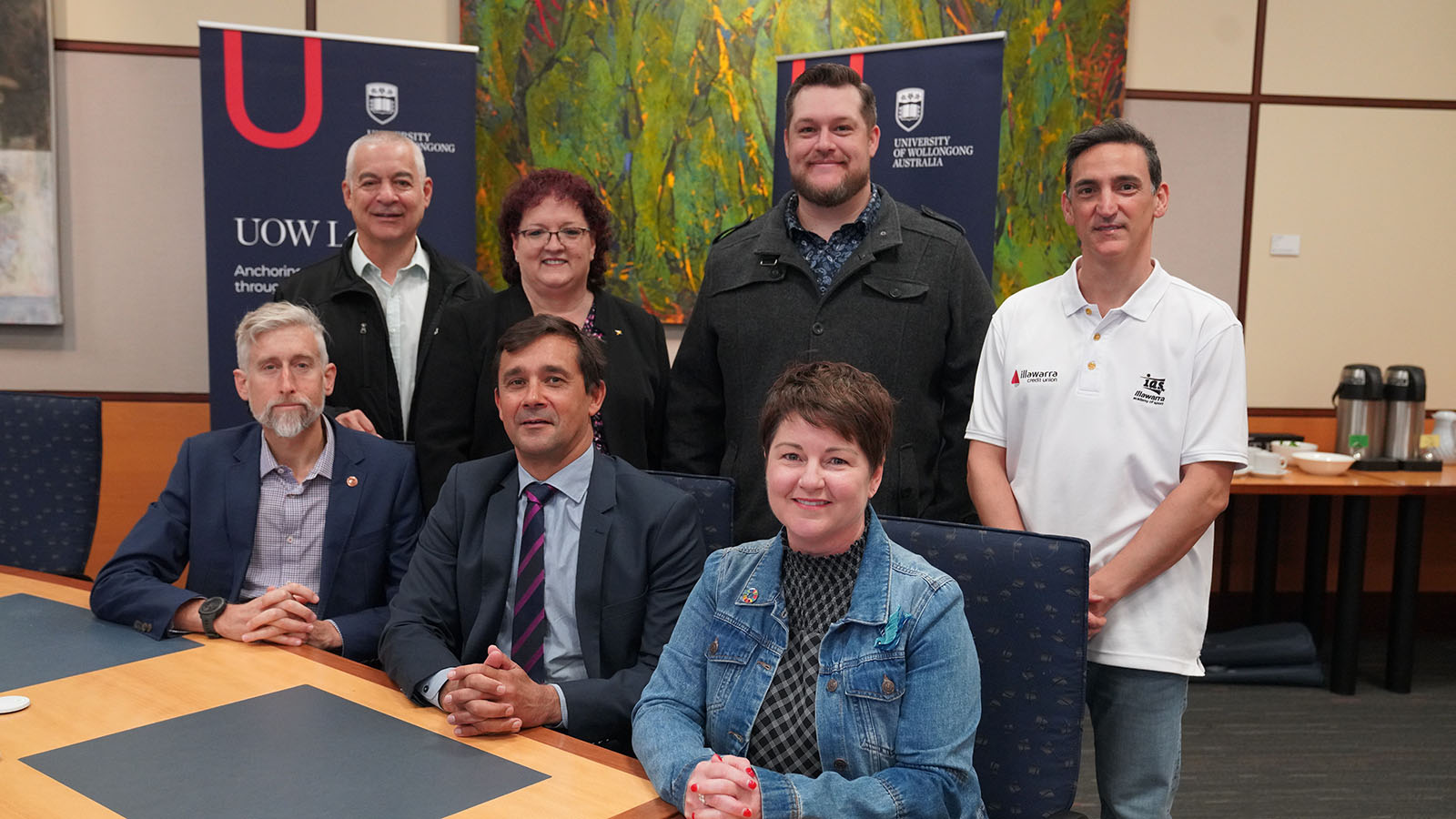 Front row: Ed Birt (The Disability Trust), UOW Acting Chief Operating Officer Matthew Wright, Kelly Andrews (Healthy Cities Illawarra). Back row: Chris Christodoulou (Greenacres), Tania Brown (UOW Local), Daniel Chin (Raise the Bar) and Salv Carmusciano (Illawarra Academy of Sport).