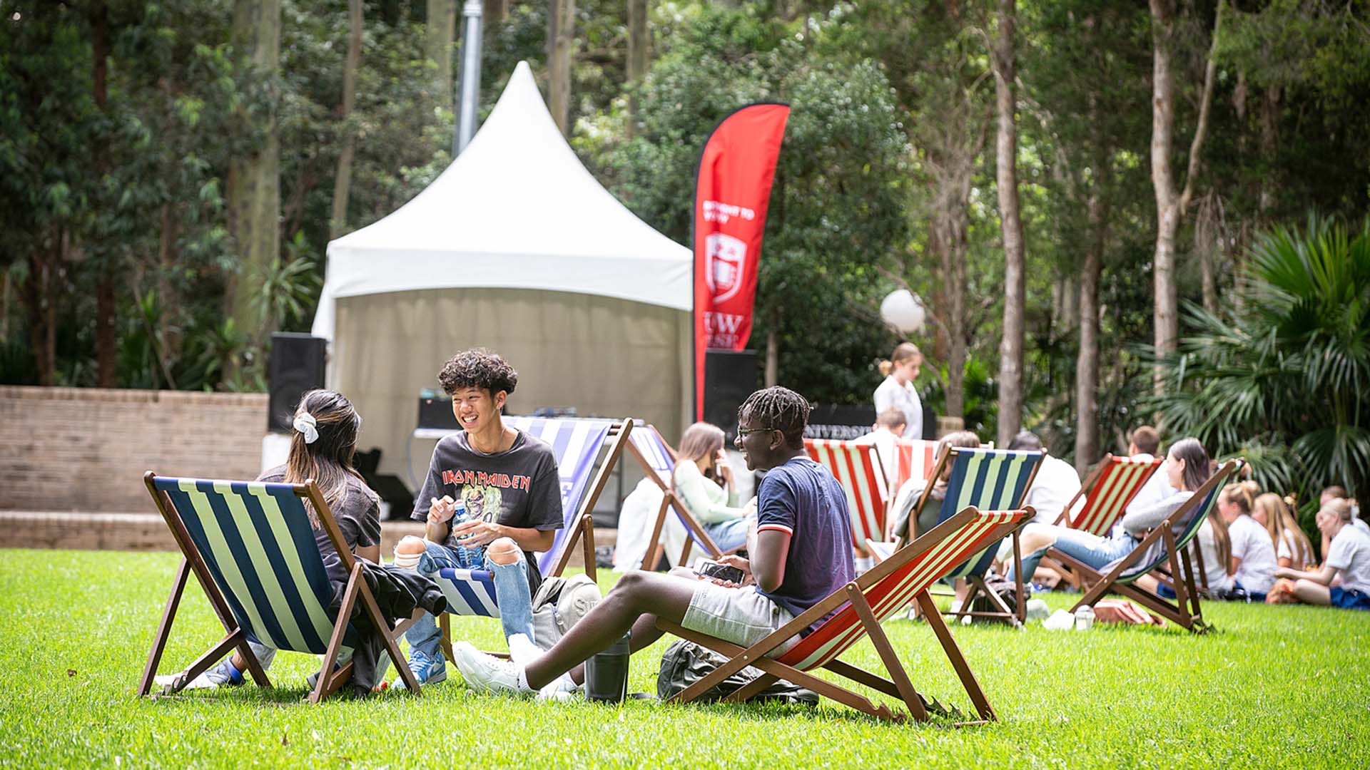 Students on the duck pond lawn