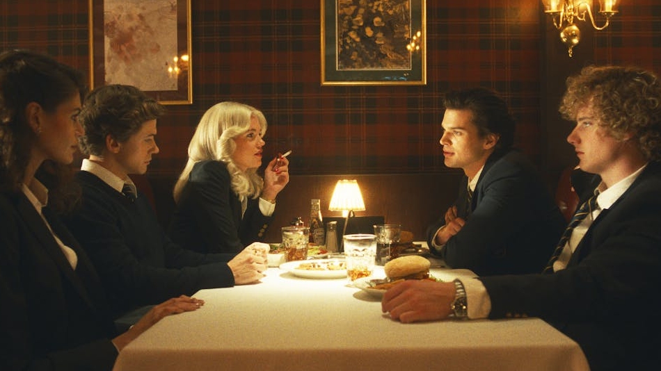 Scene from The Shards, characters sitting around a table. Credit: Disney+