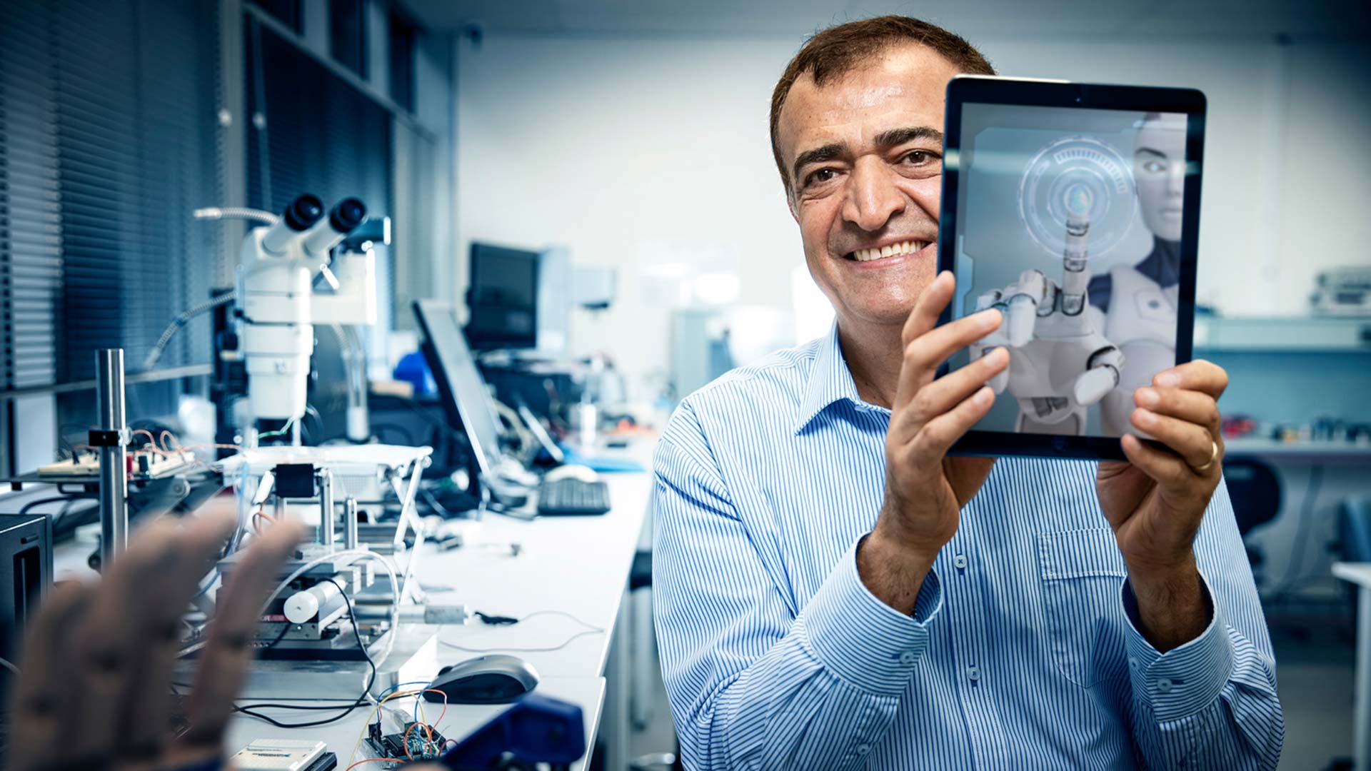 Gursel Alici Exec Dean EIS in engineering laboratory