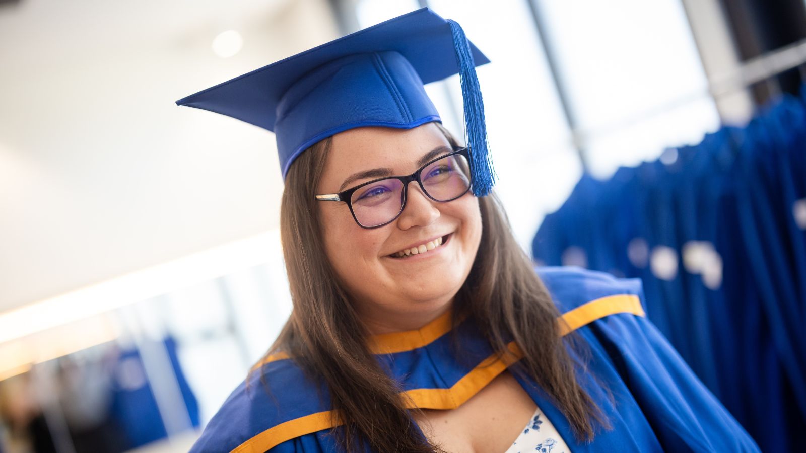 Master of Teaching graduate Jess Campbell smiles during the UOW Eurobodalla graduation ceremony. January 2025