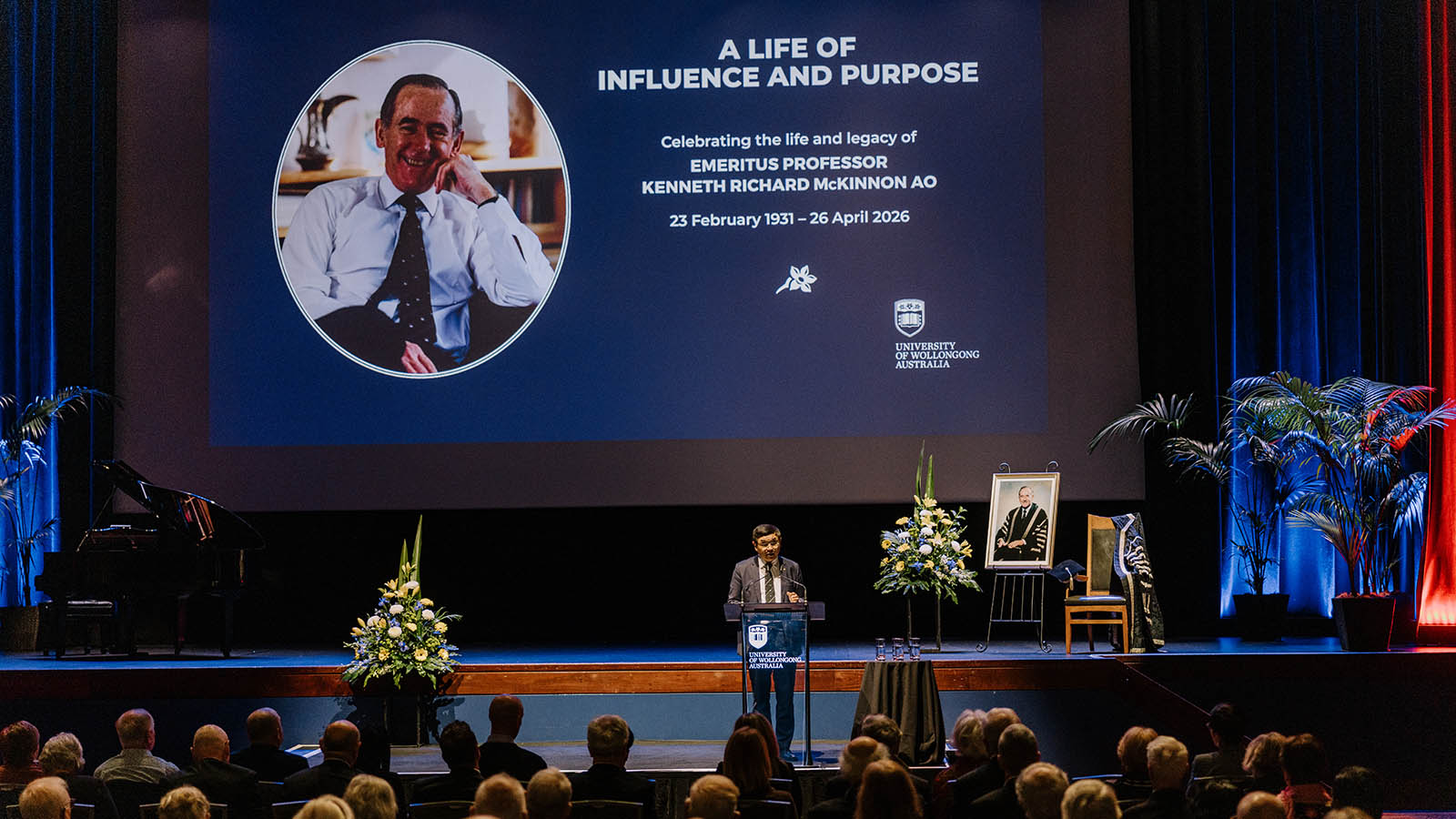 UOW Vice-Chancellor Professor Max Lu speaks at the event to celebrate the life of Ken McKinnon.