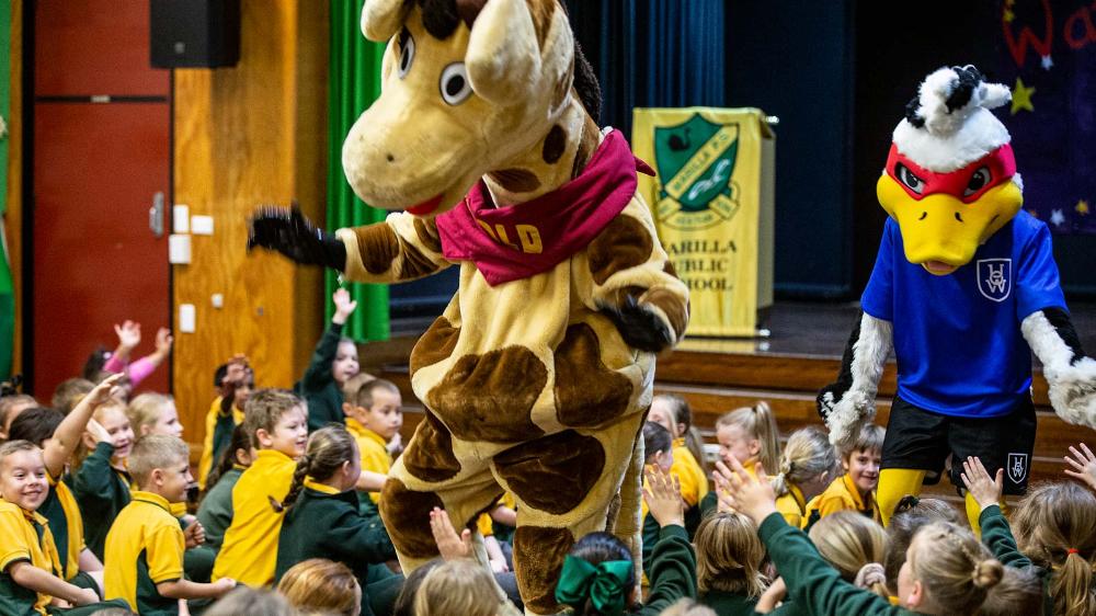 Baxter the Duck and Healthy Harold visit Warilla Public School. Photo: Paul Jones