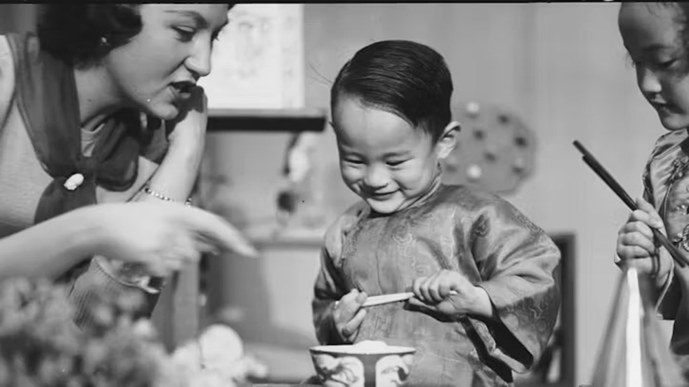 A young Asian boy and girl on a 1950s Australian TV show.