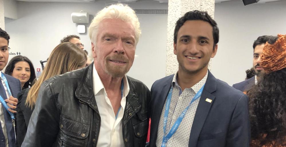 UOW graduate Narayan Khanal with Sir Richard Branson. Photo: Supplied