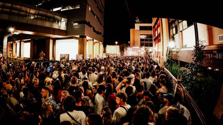 Performer and crowd scenes from the 2023 Yours & Owls Festival at UOW