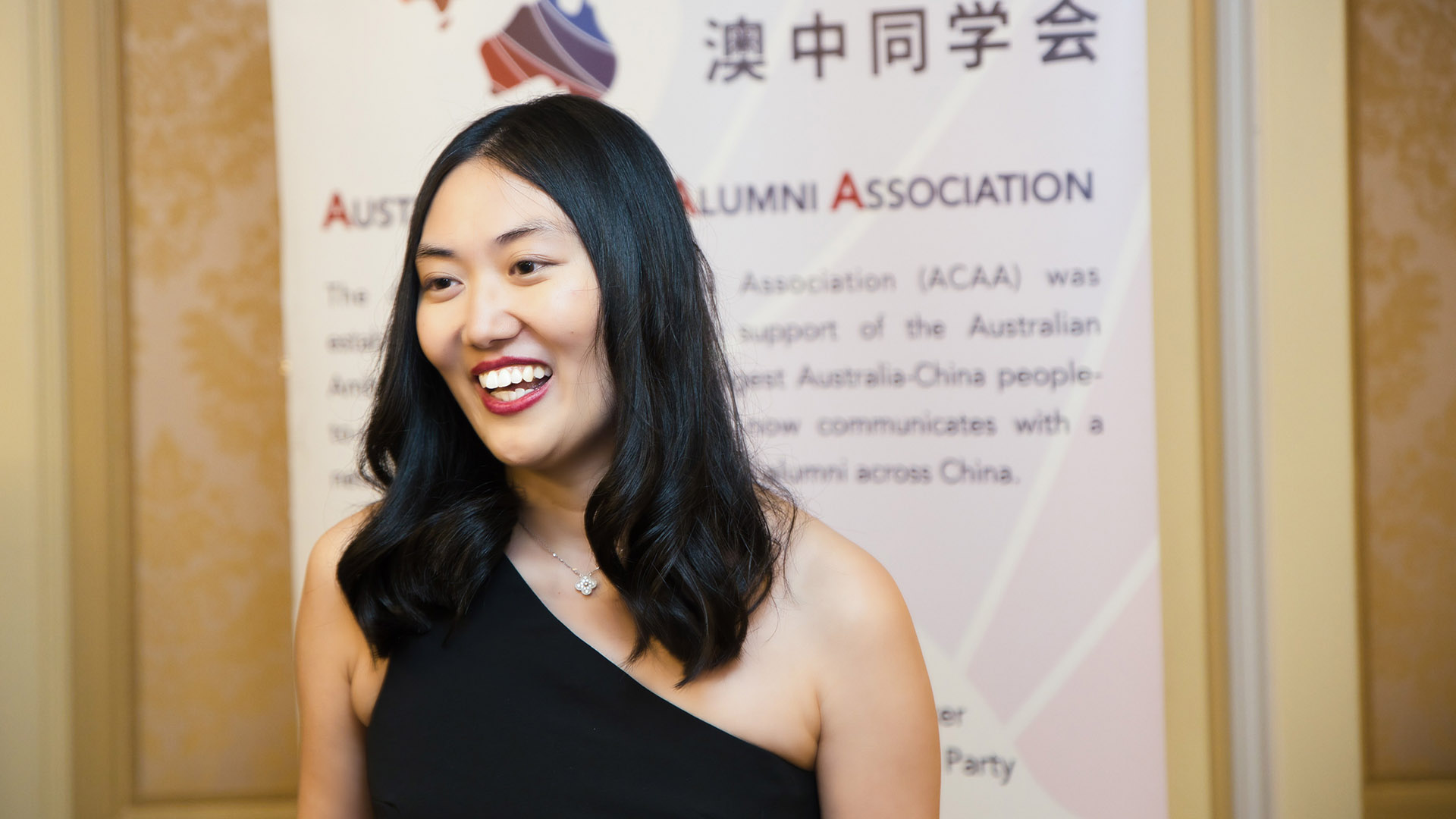 UOW alumni Susan Zhang is presented with a Judges