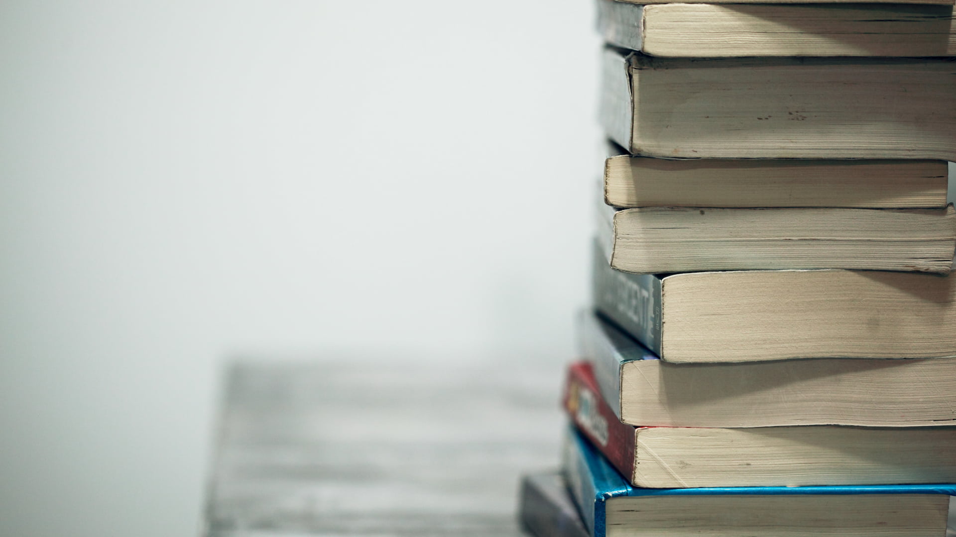A generic stack of books on a desk