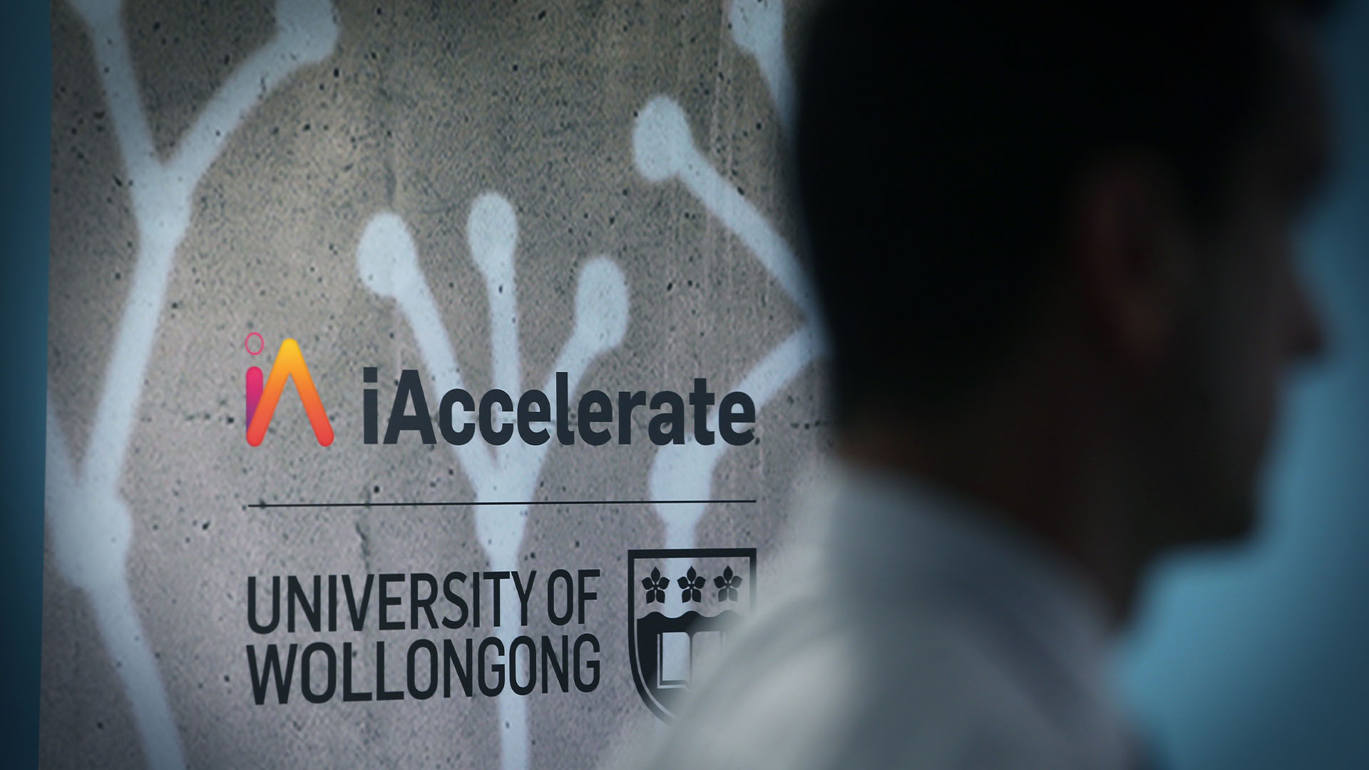 Logo of iAccelerate next to the logo of UOW