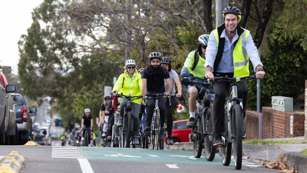 Academics and students ride their bikes in Ride2UOW event