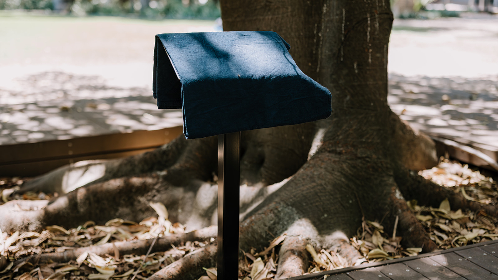 Covered Campus Tree Walk sign with black cloth for unveiling on Launch day