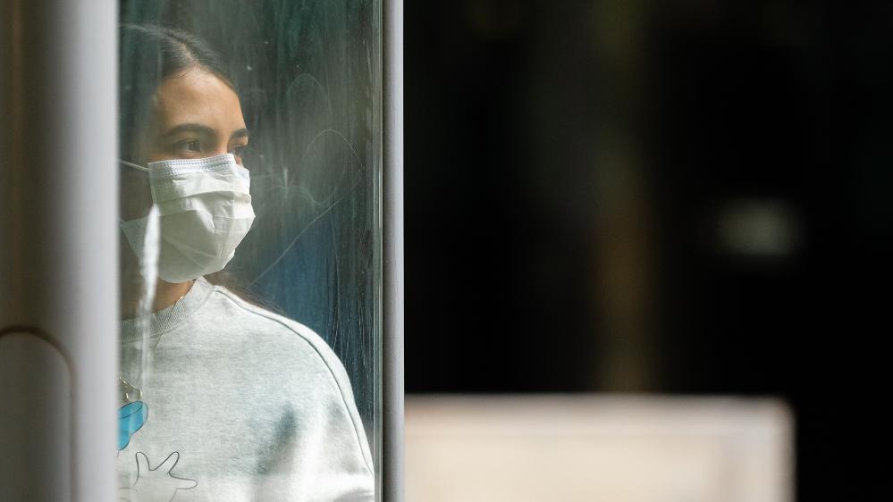 A women in a face mask