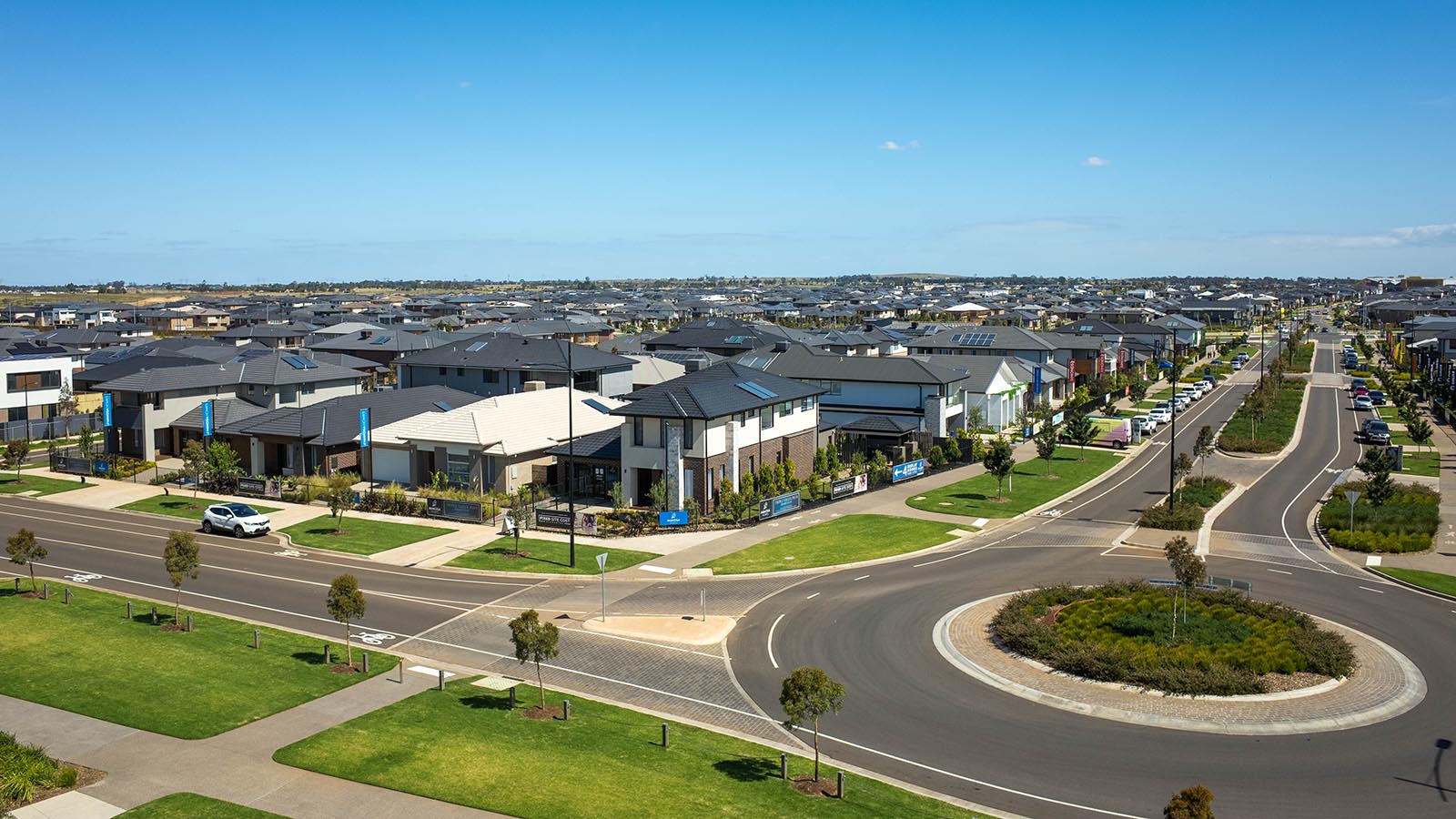 Aerial view of a new Australian suburb with lots of big houses.
