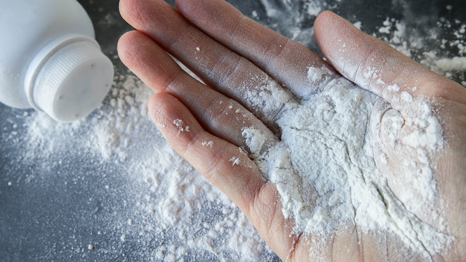 Talcum powder on hands